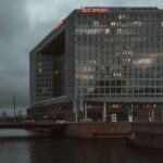 The iconic Der Spiegel building in Hamburg on a cloudy day.